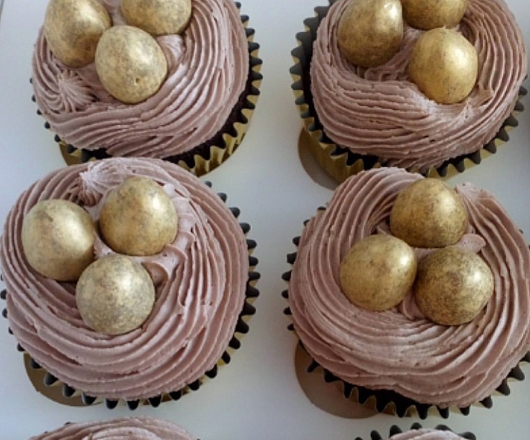 Easter nest cupcakes with golden eggs