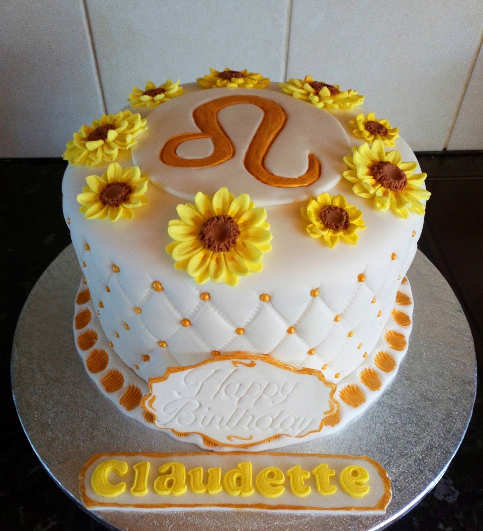 "Leo" zodiac inspired cake with sunflowers