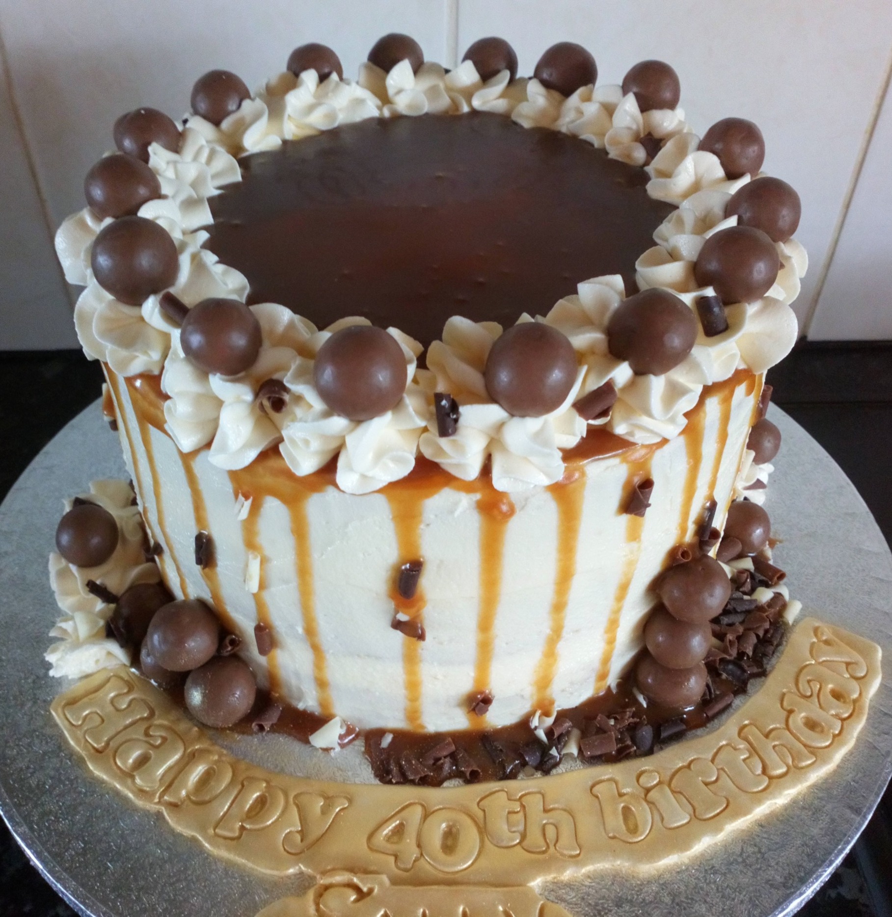 Salted caramel drip cake with maltesers