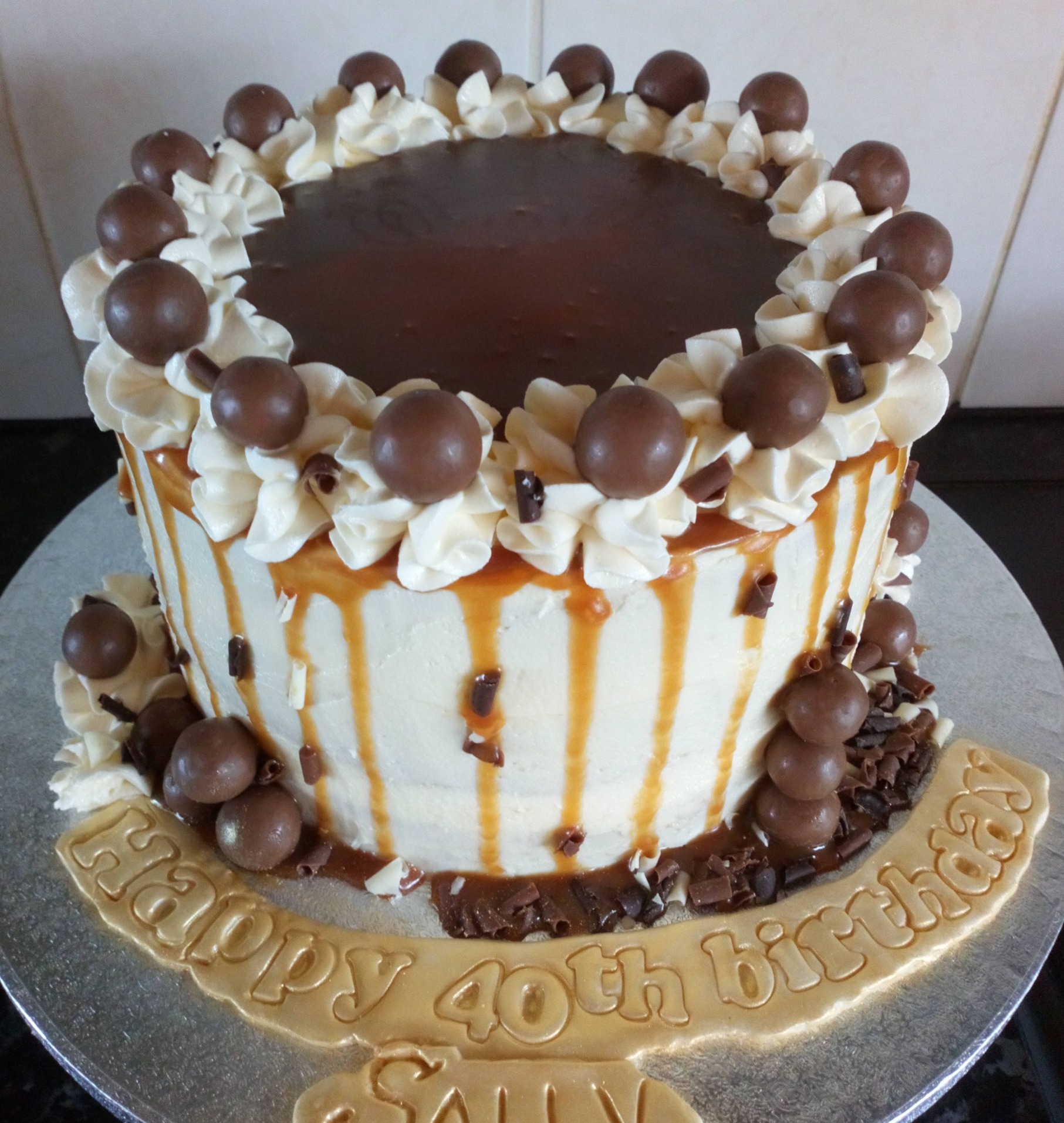 Salted caramel drip cake with maltesers