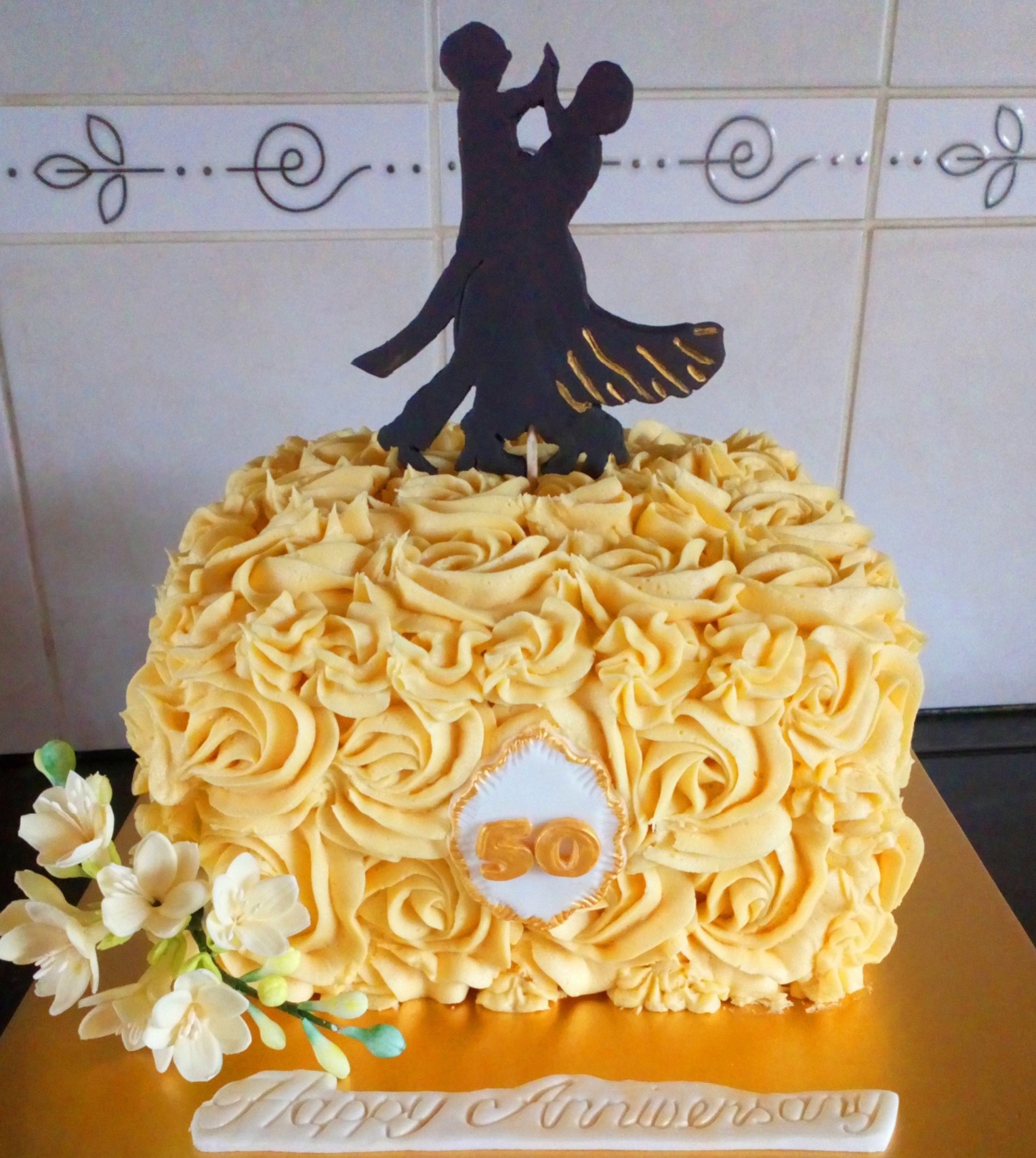 50th wedding anniversary buttercream swirl cake with ballroom dancers