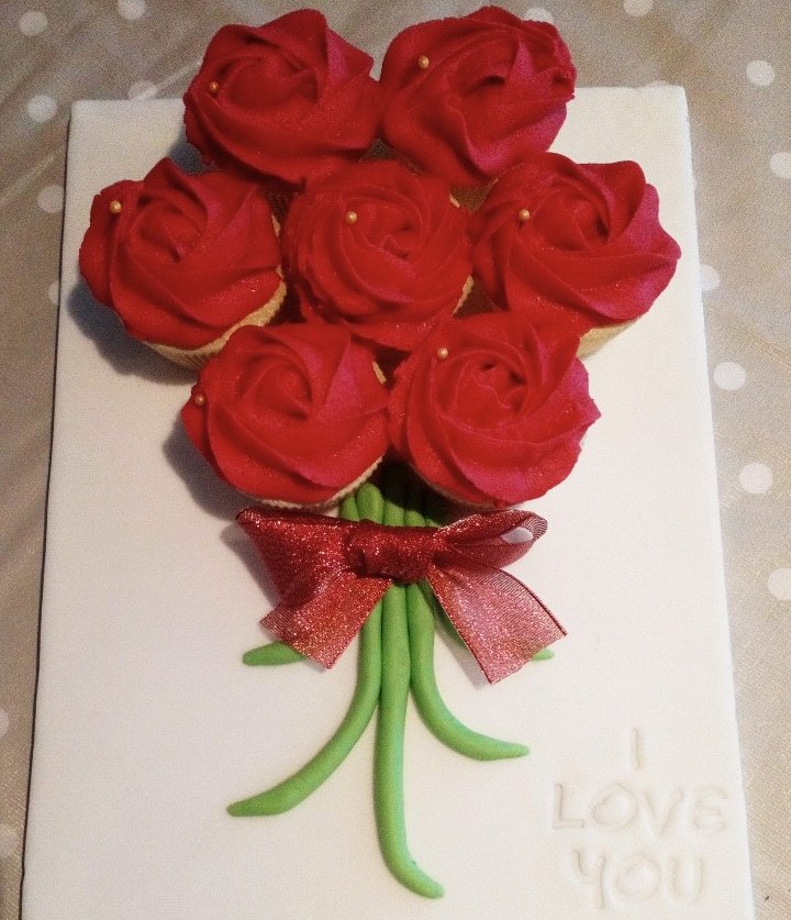 Valentines cupcake bouquet mounted on an iced board