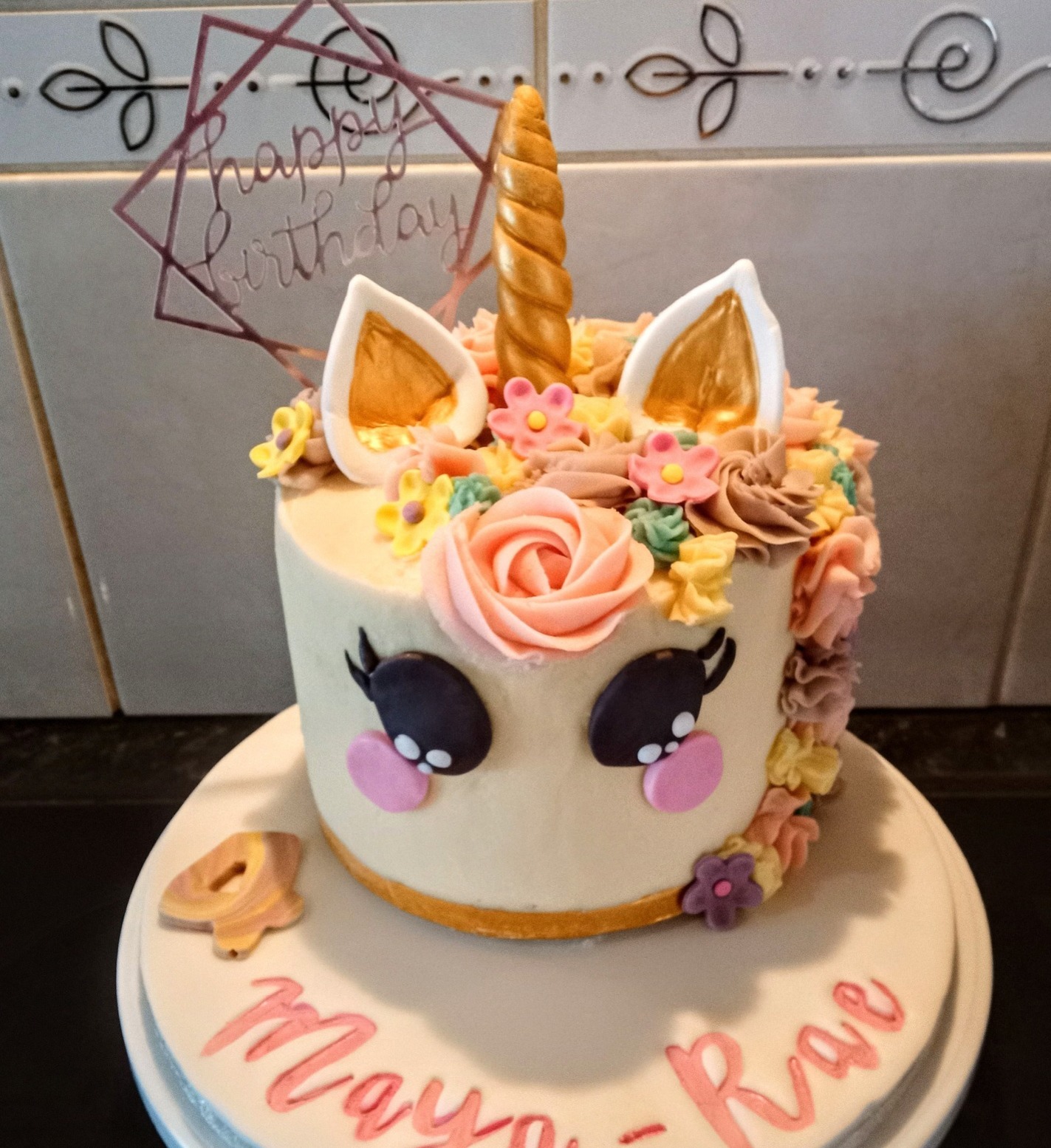 Fun 4th birthday unicorn cake with hand-piped buttercream maine