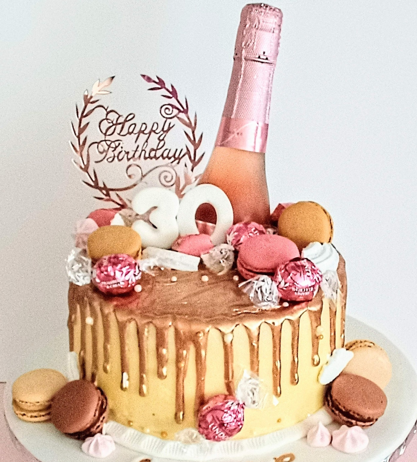 ladies 30th drip cake and champagne bottle