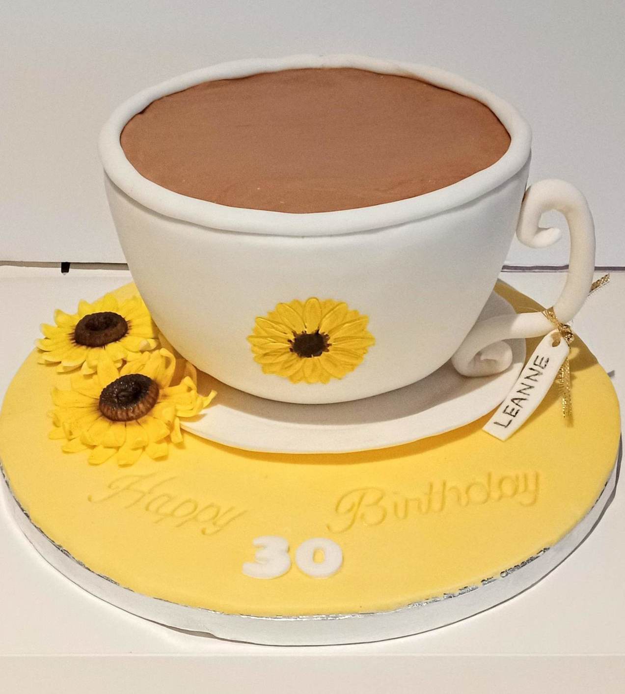 ladies 30th 3D teacup and saucer cake with sunflowers