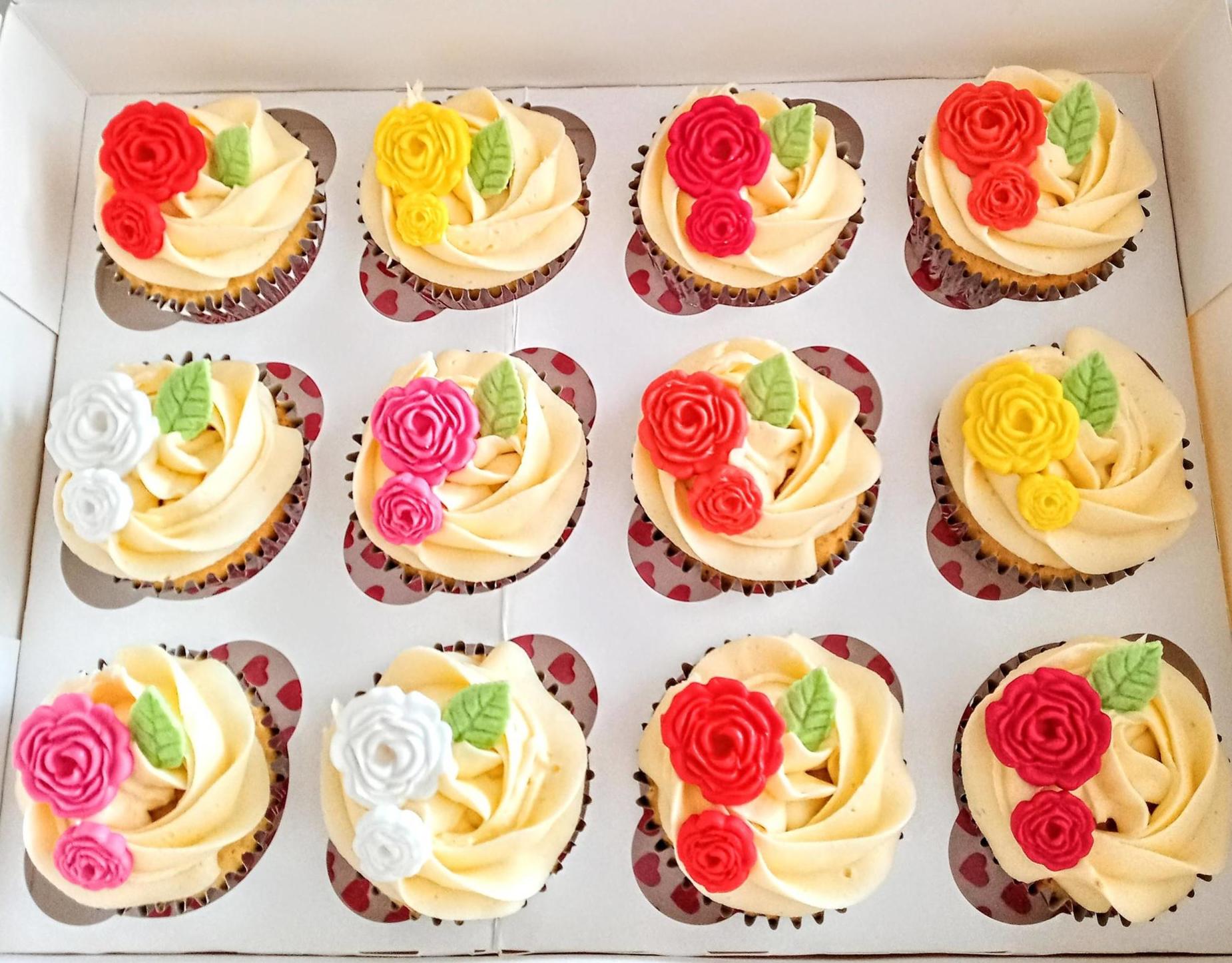 Birthday cupcakes with coloured fondant roses