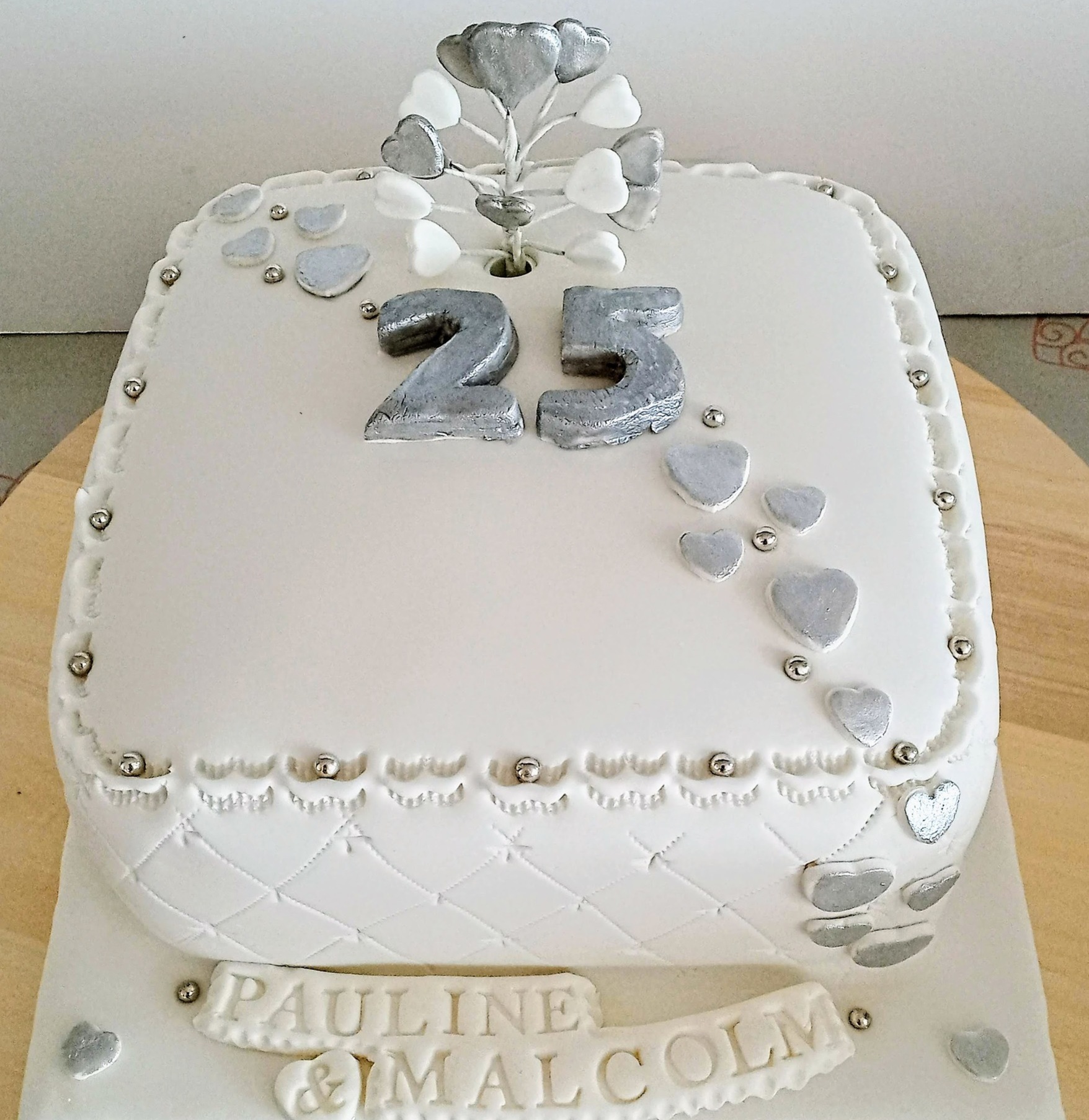 25th silver and white wedding anniversary cake