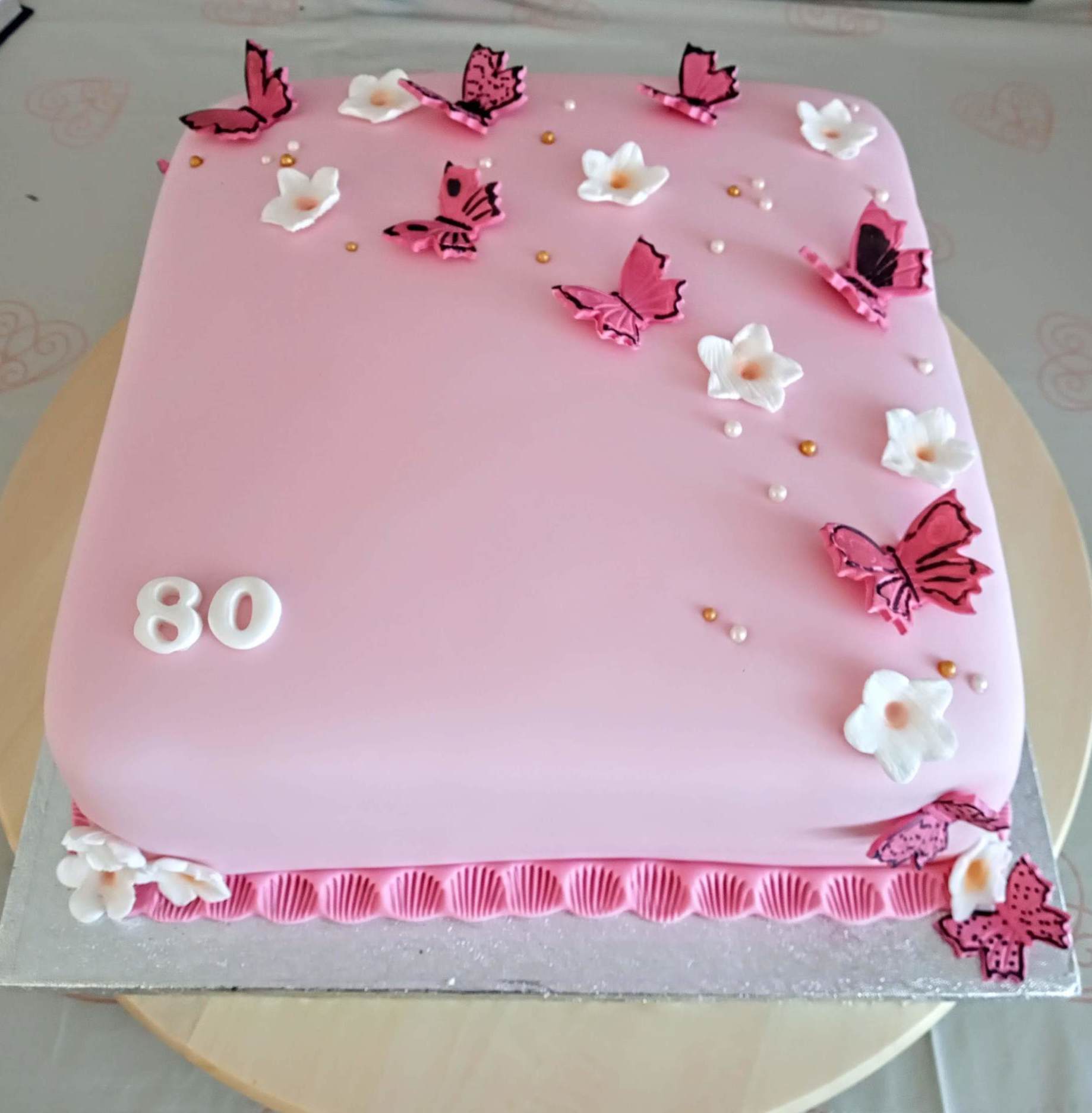 Ladies 80th birthday butterfly and blossoms cake