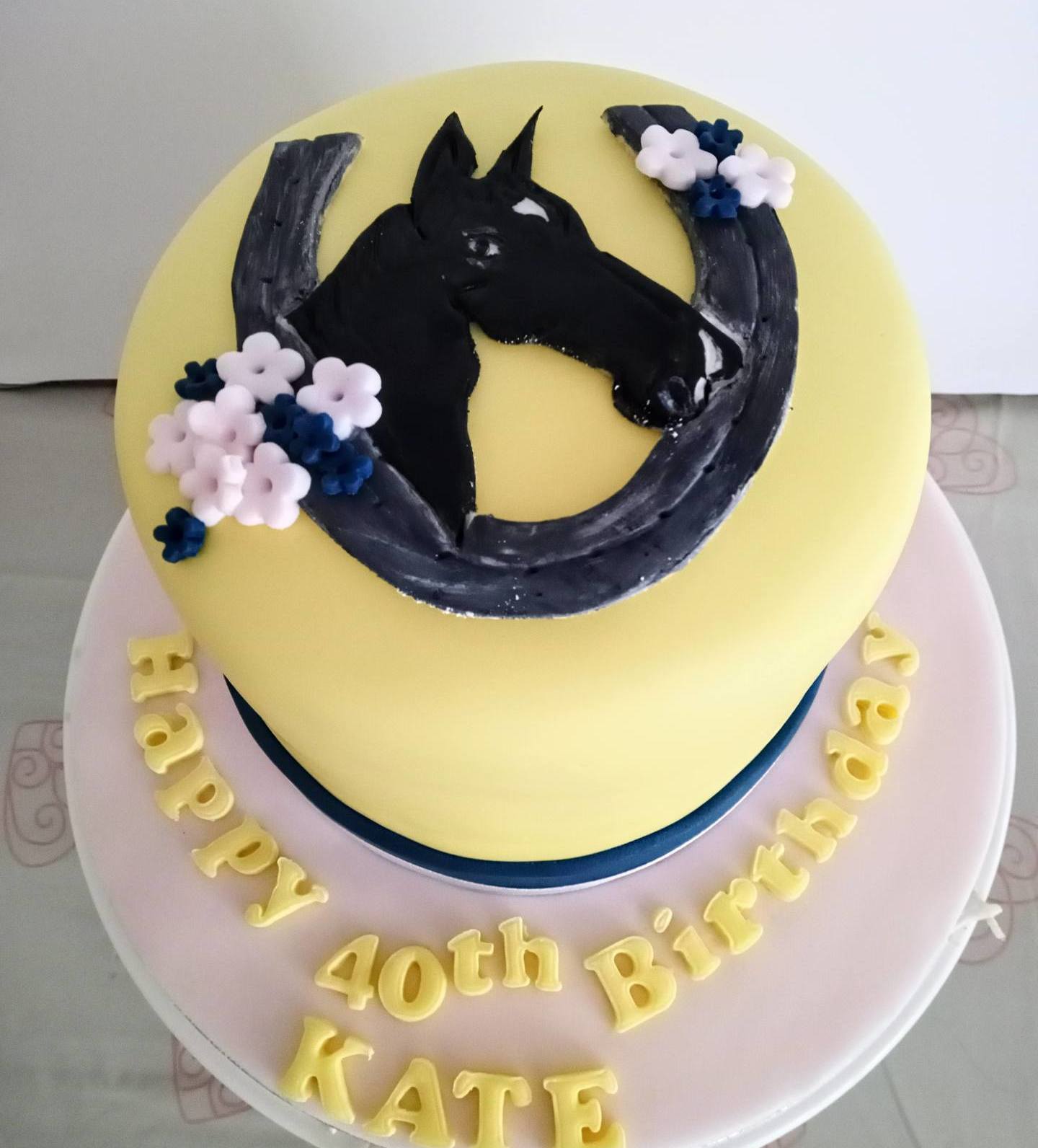Ladies birthday cake with sugar image of a horse