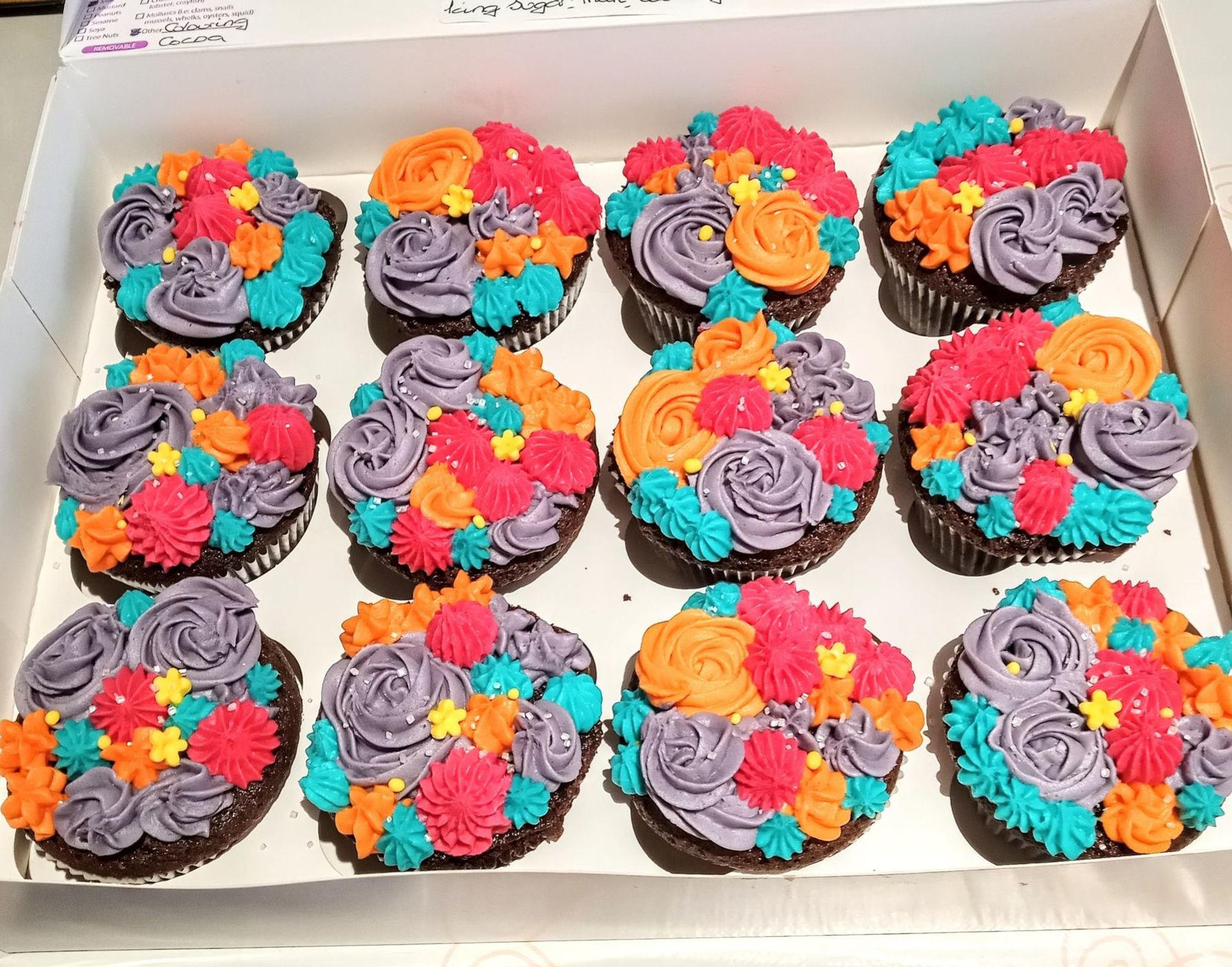 Colourful variety cupcakes