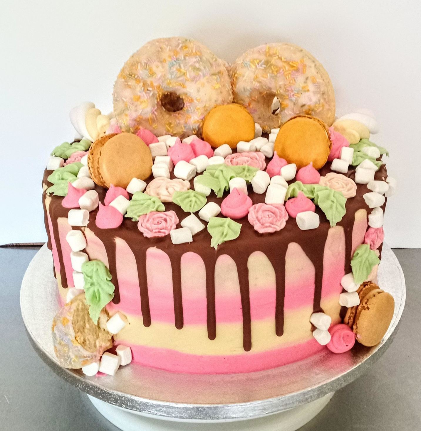 A fun ladies doughnut drip cake