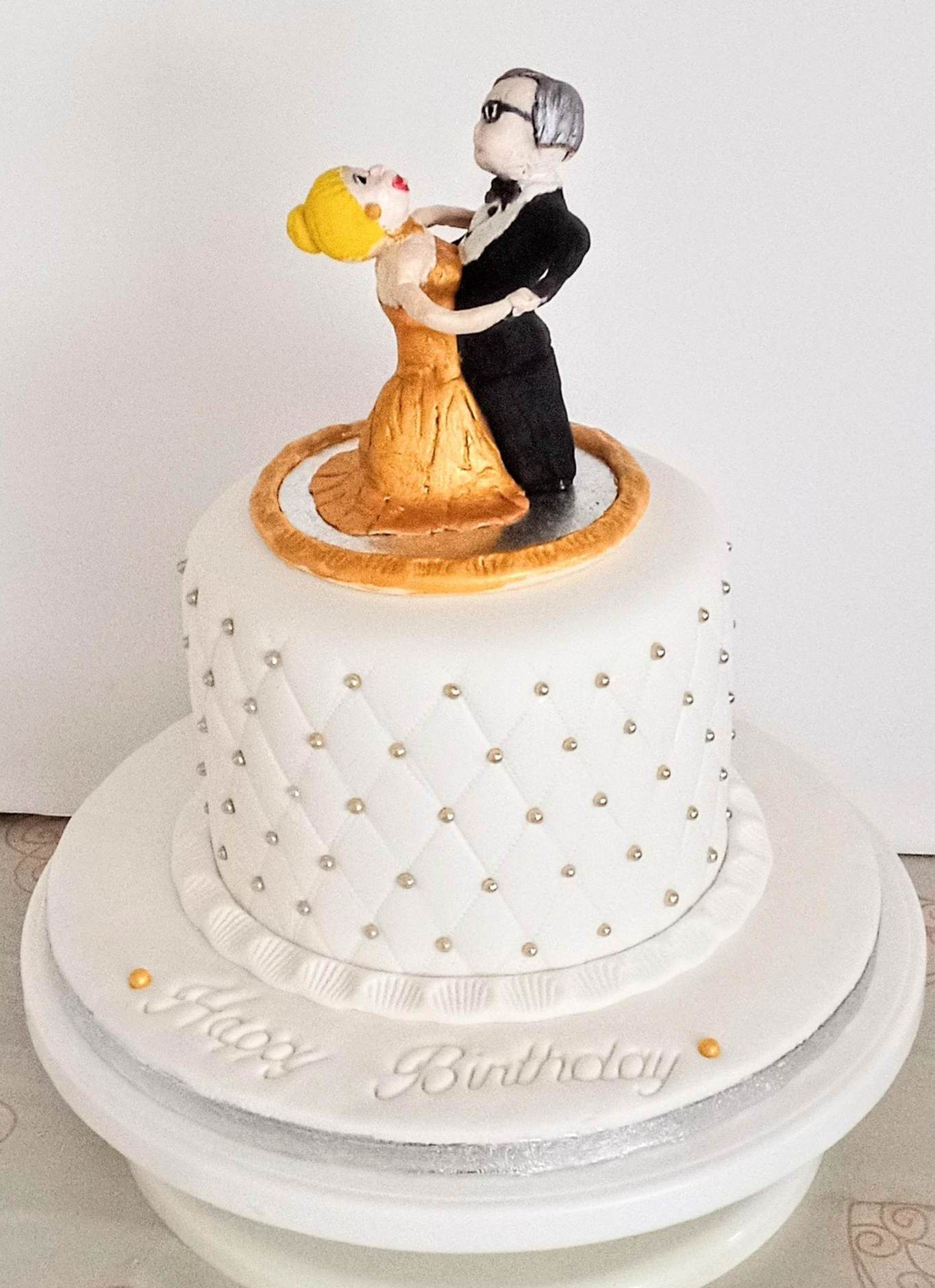A Ballroom dancing couple birthday cake