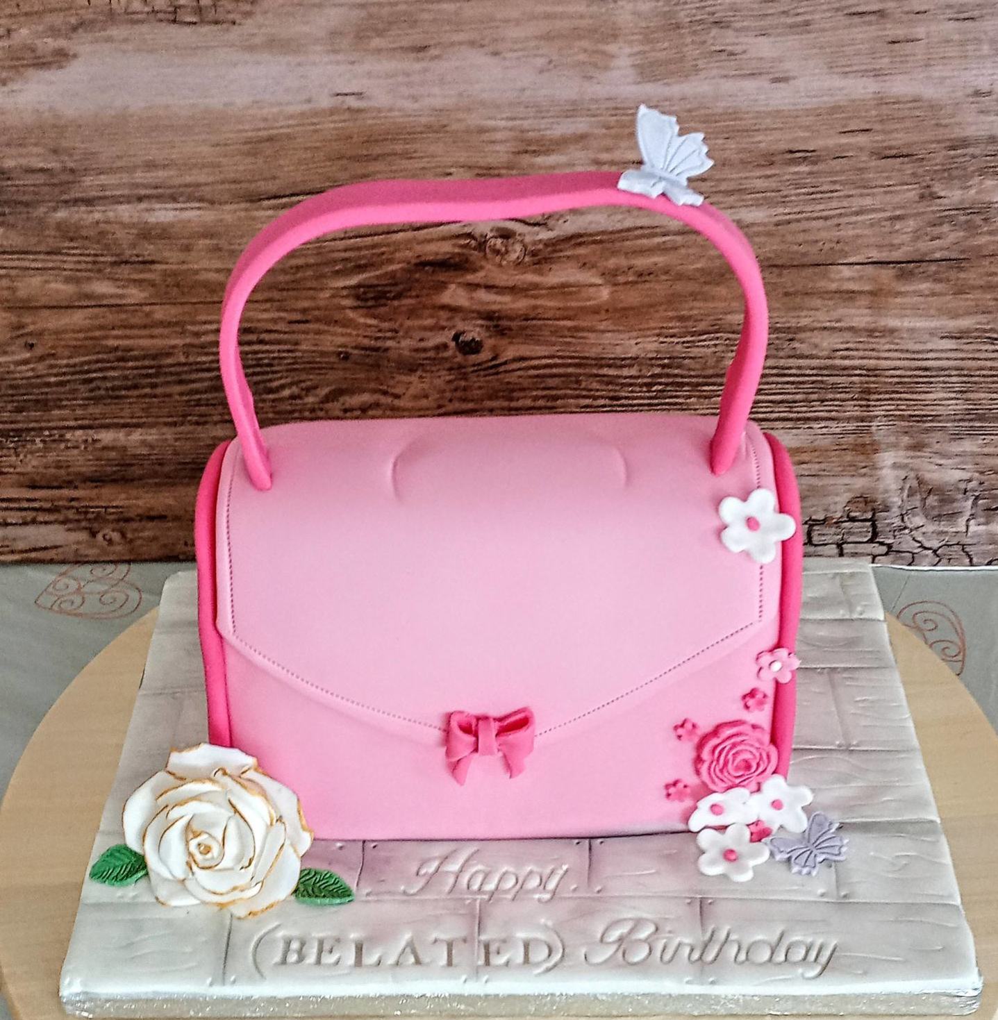 Cute pink ladies novelty handbag cake