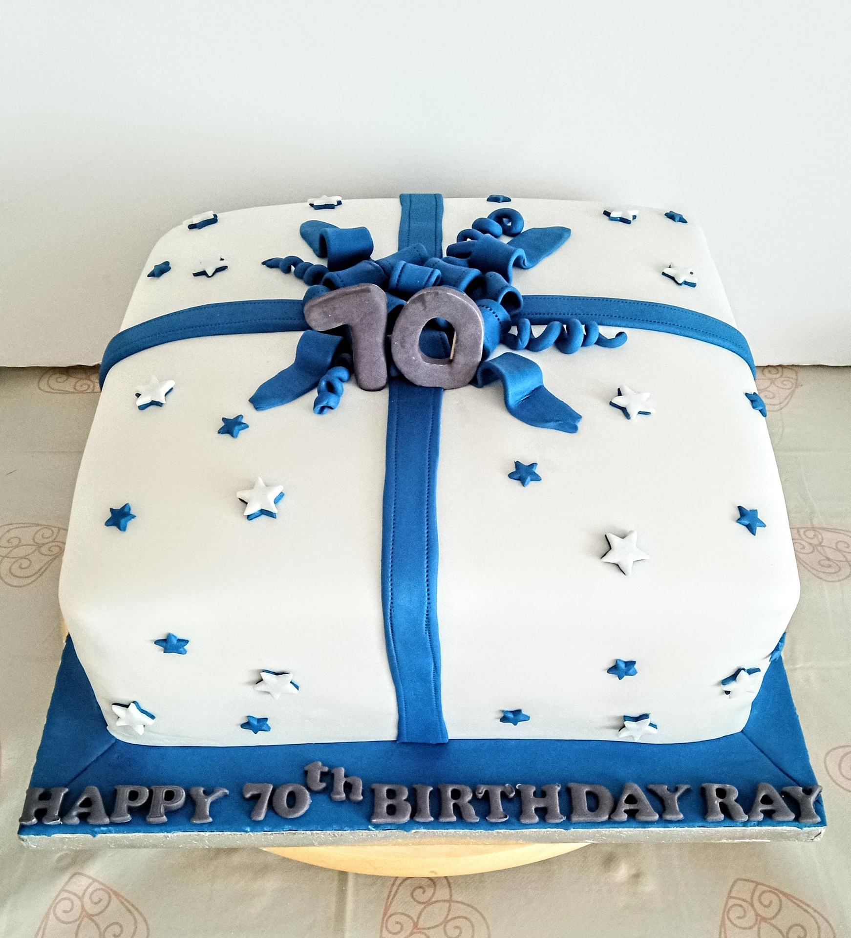A 70th birthday present cake with star effect