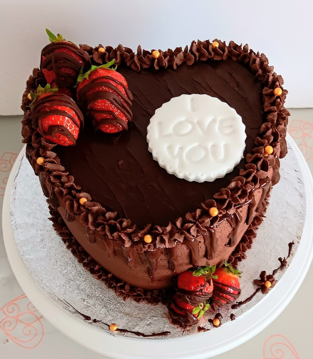 Chocolate heart shaped anniversary cake