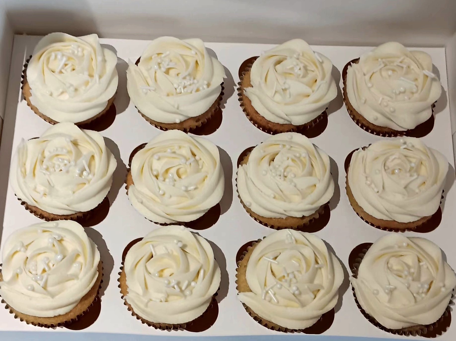 All white wedding/engagement cupcakes