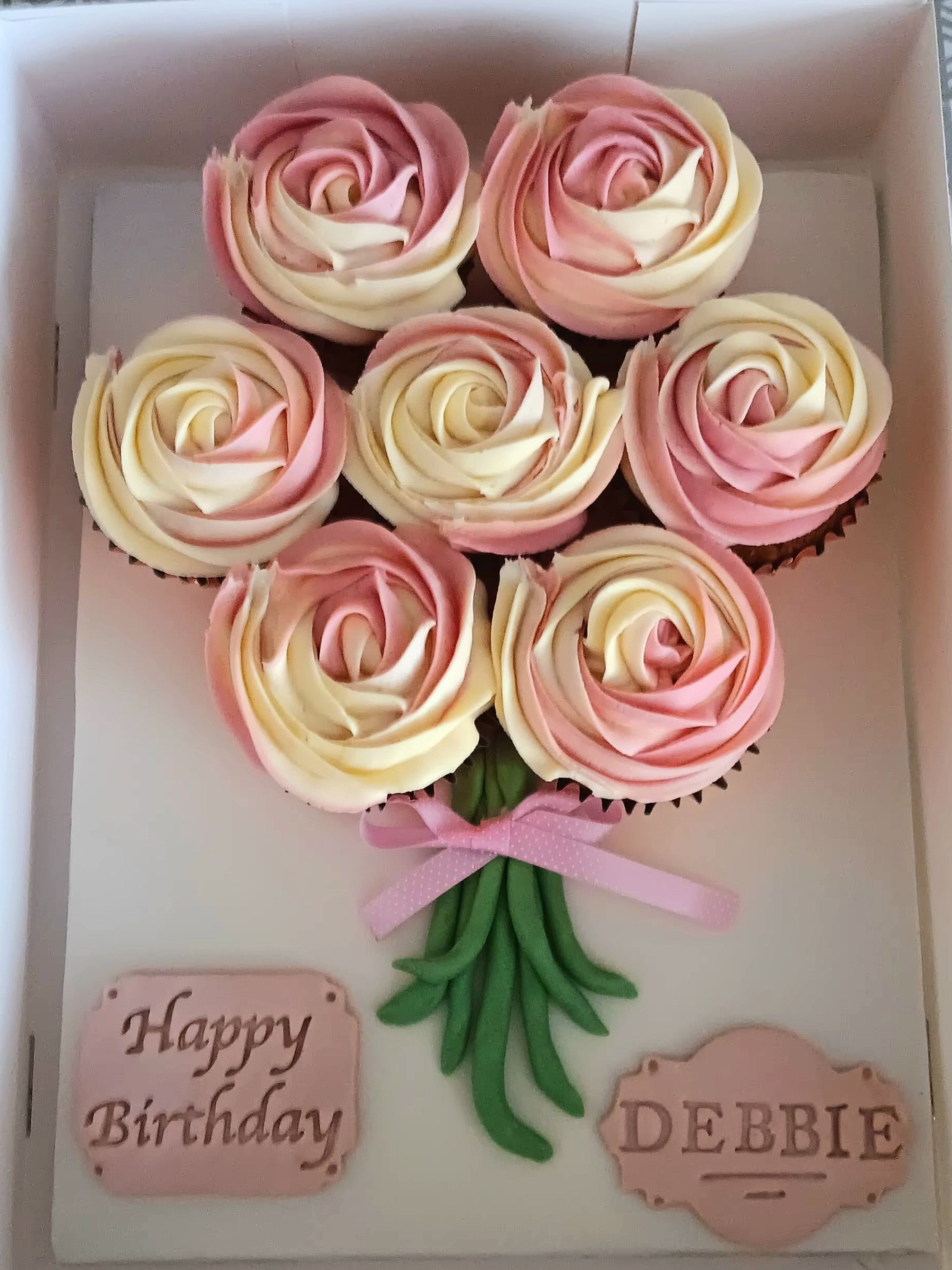 Pink and white rose swirl cupcake bouquet