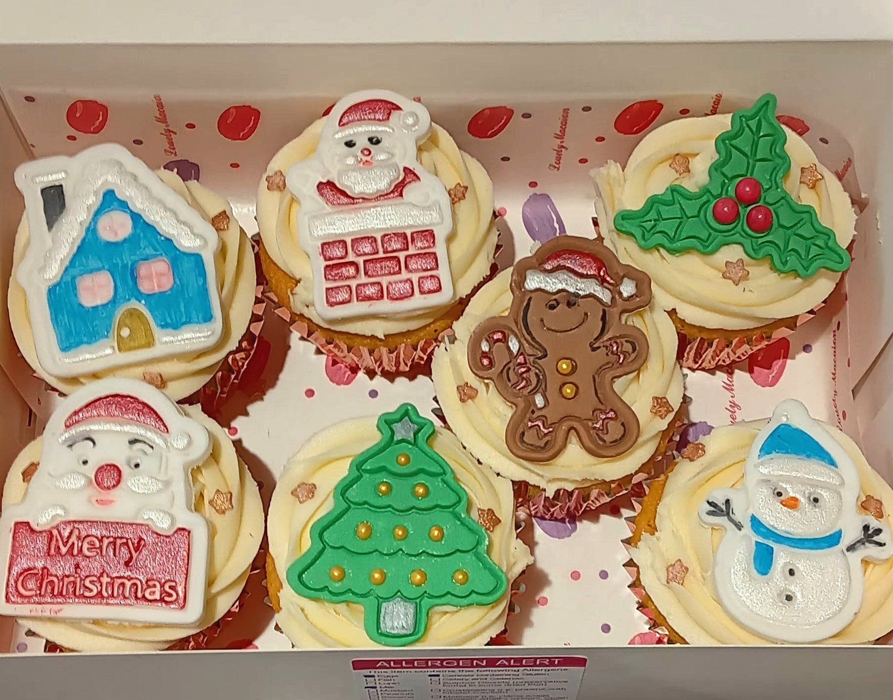 Box of 7 christmas decorated cupcakes
